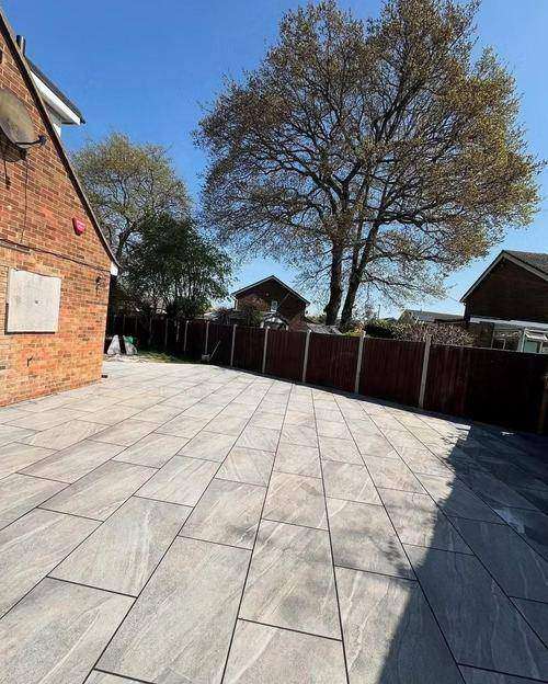 New porcelain patio at the back of a house