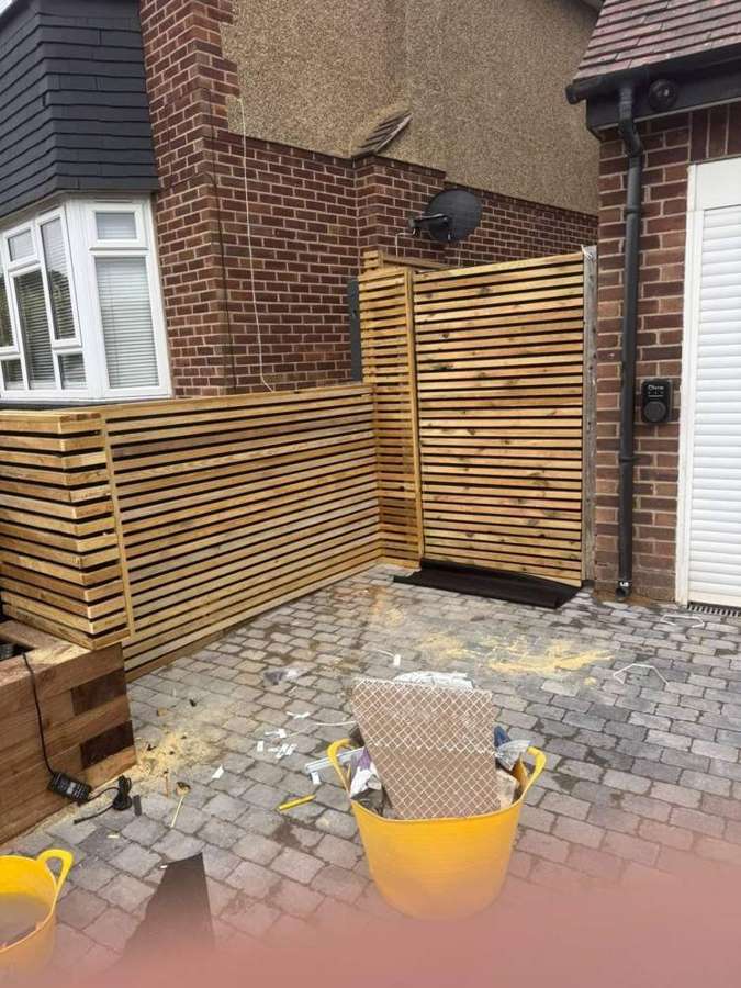 Slatted fencing and gate